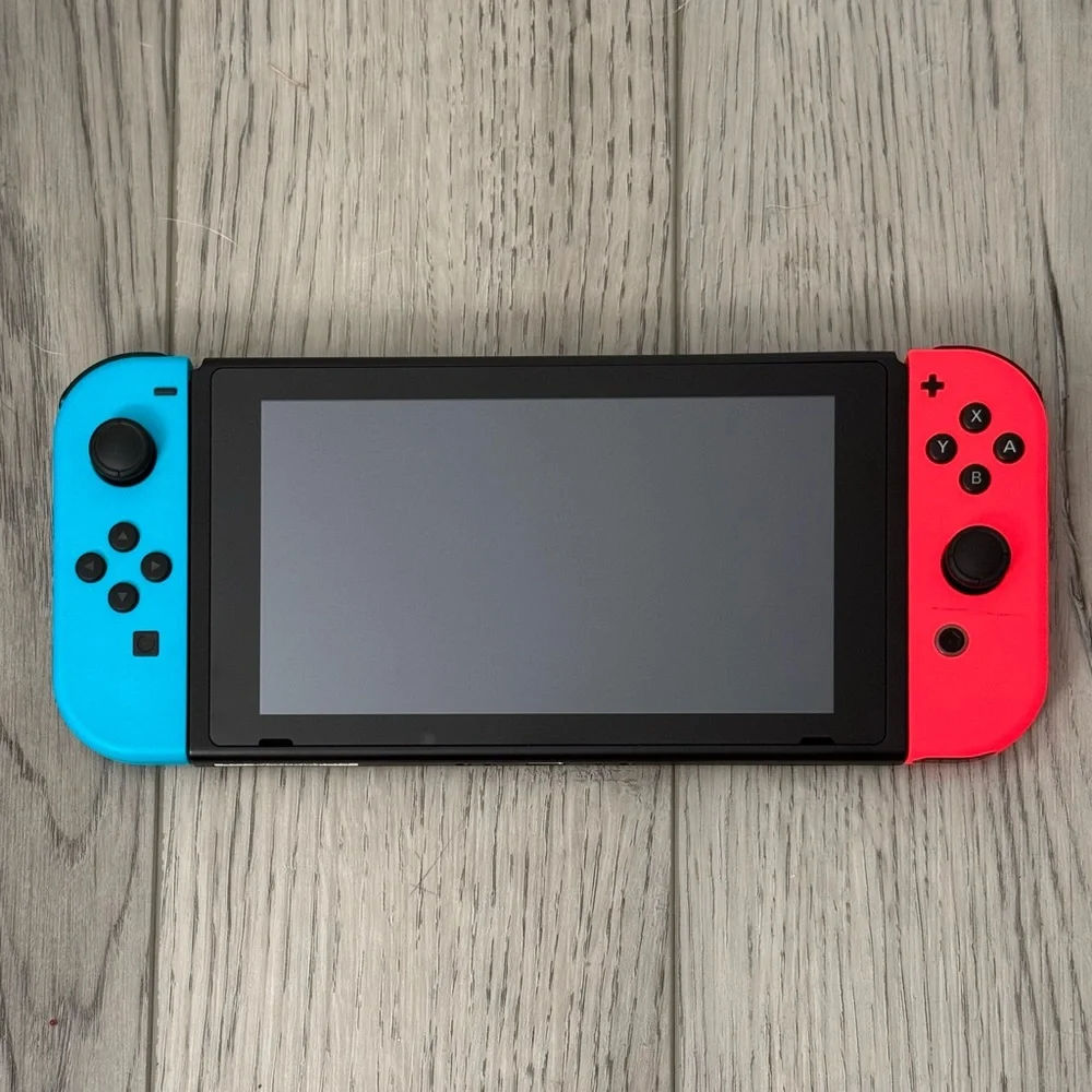 Nintendo Switch with Neon Blue and Neon Red Joy-Con